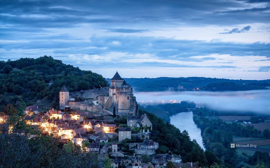 Castelnaud Castle before sunrise, Dordogne, France