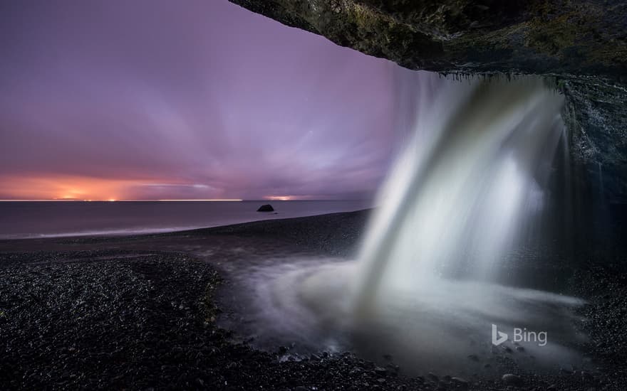 View of a waterfall at Mystic Beach in Juan de Fuca Provincial Park, B.C. during dusk